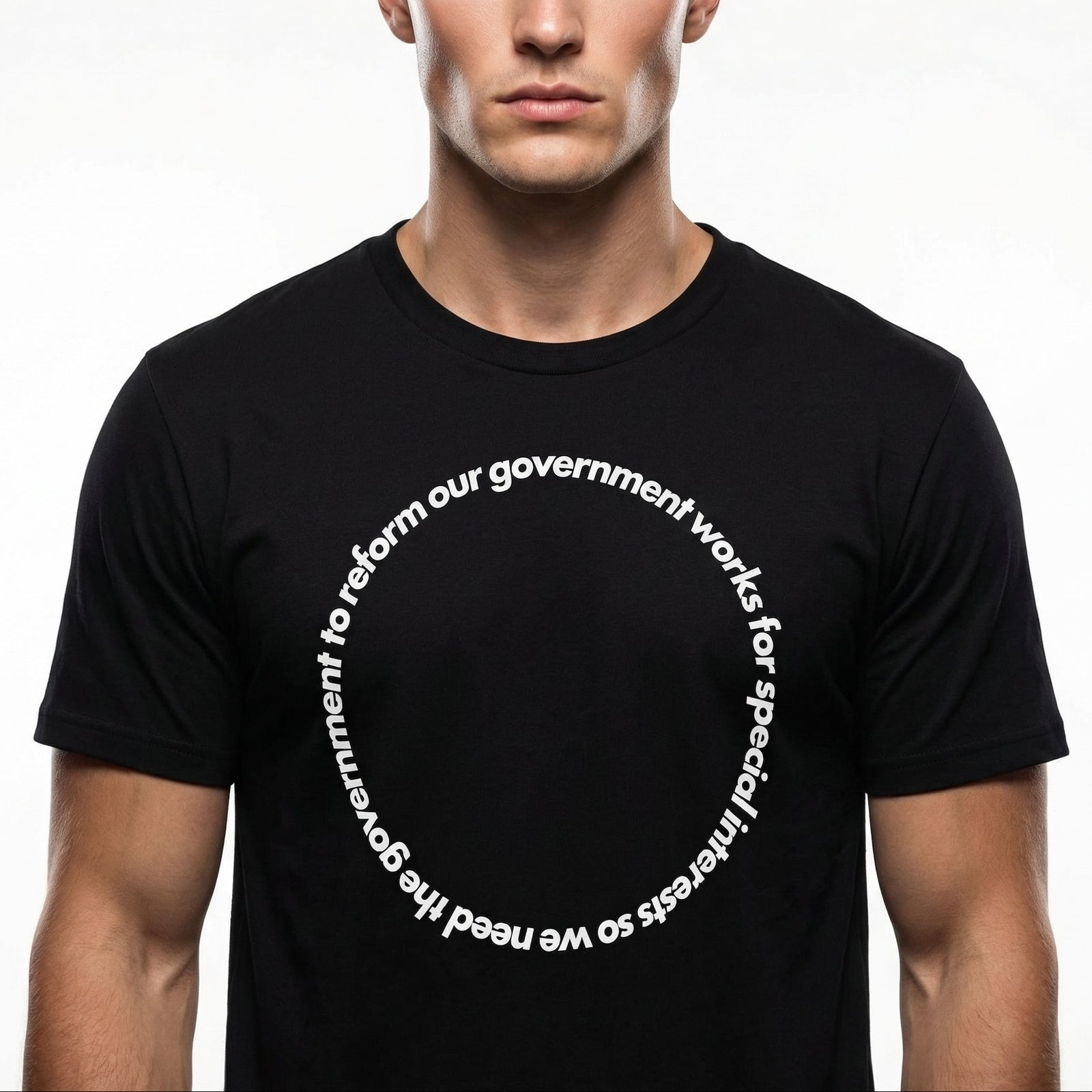 Man wearing a black t-shirt with white text on a plain background