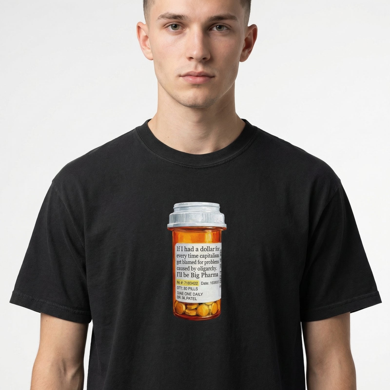 Person wearing a black t-shirt with a graphic of a pill bottle and text.