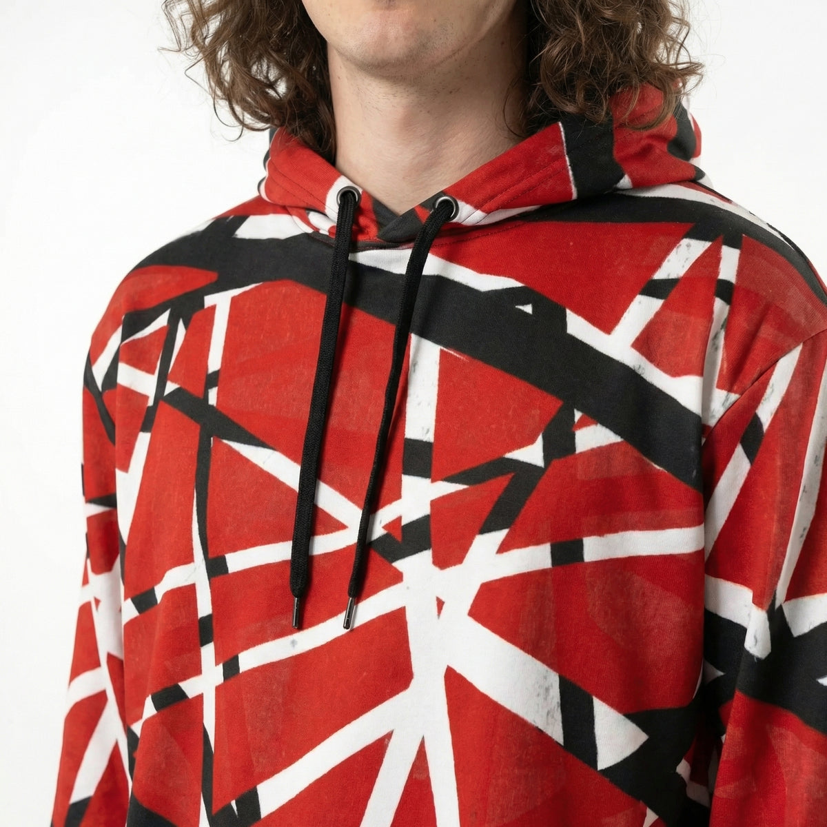 Person wearing a red, black, and white geometric patterned Frankenstripes Cotton Hoodie.