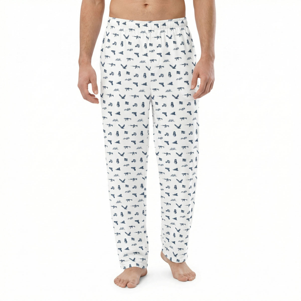White pajama pants with black fox pattern worn by a person on a white background