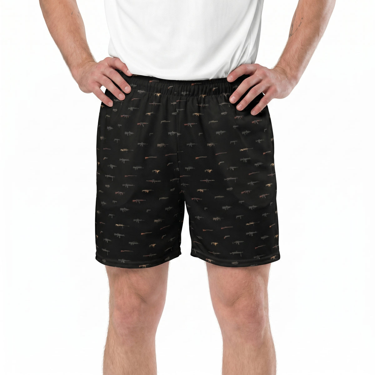 Person wearing black shorts with a pattern on a white background