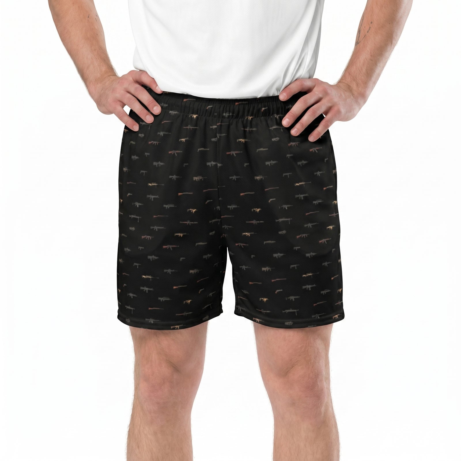 Person wearing black shorts with a pattern on a white background