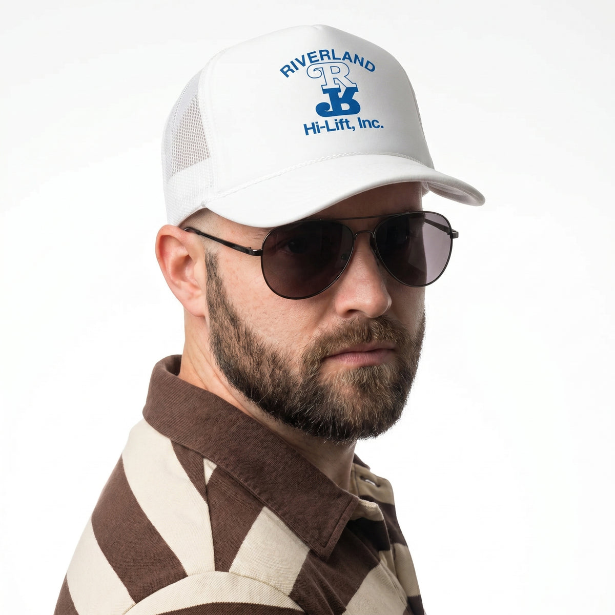 Man wearing a white cap with 'Riverland Hi-Lift, Inc.' logo and sunglasses on a white background