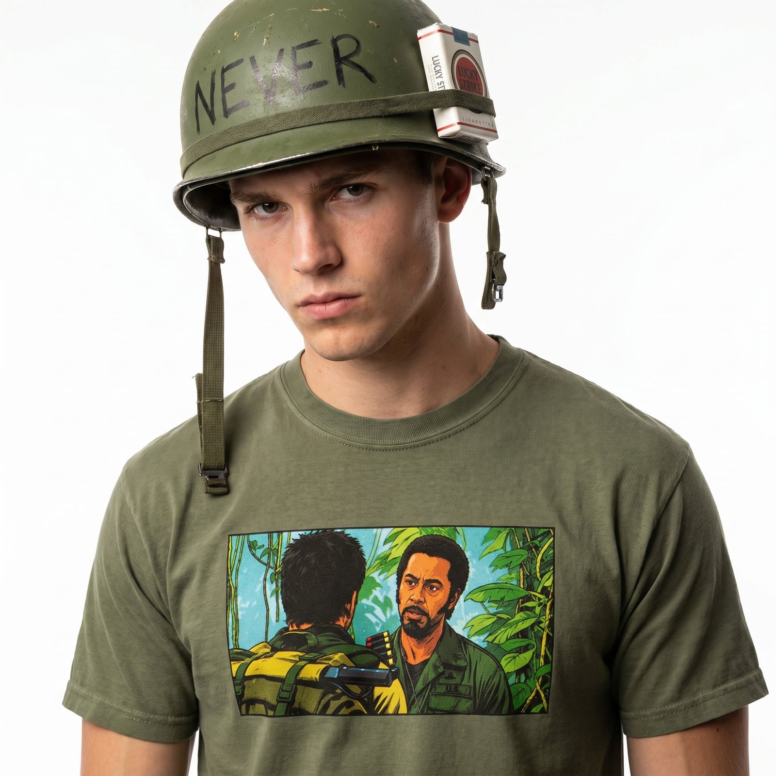 Never Go Full Graphic Tee close-up with Vietnam movie scene artwork on olive garment-dyed shirt