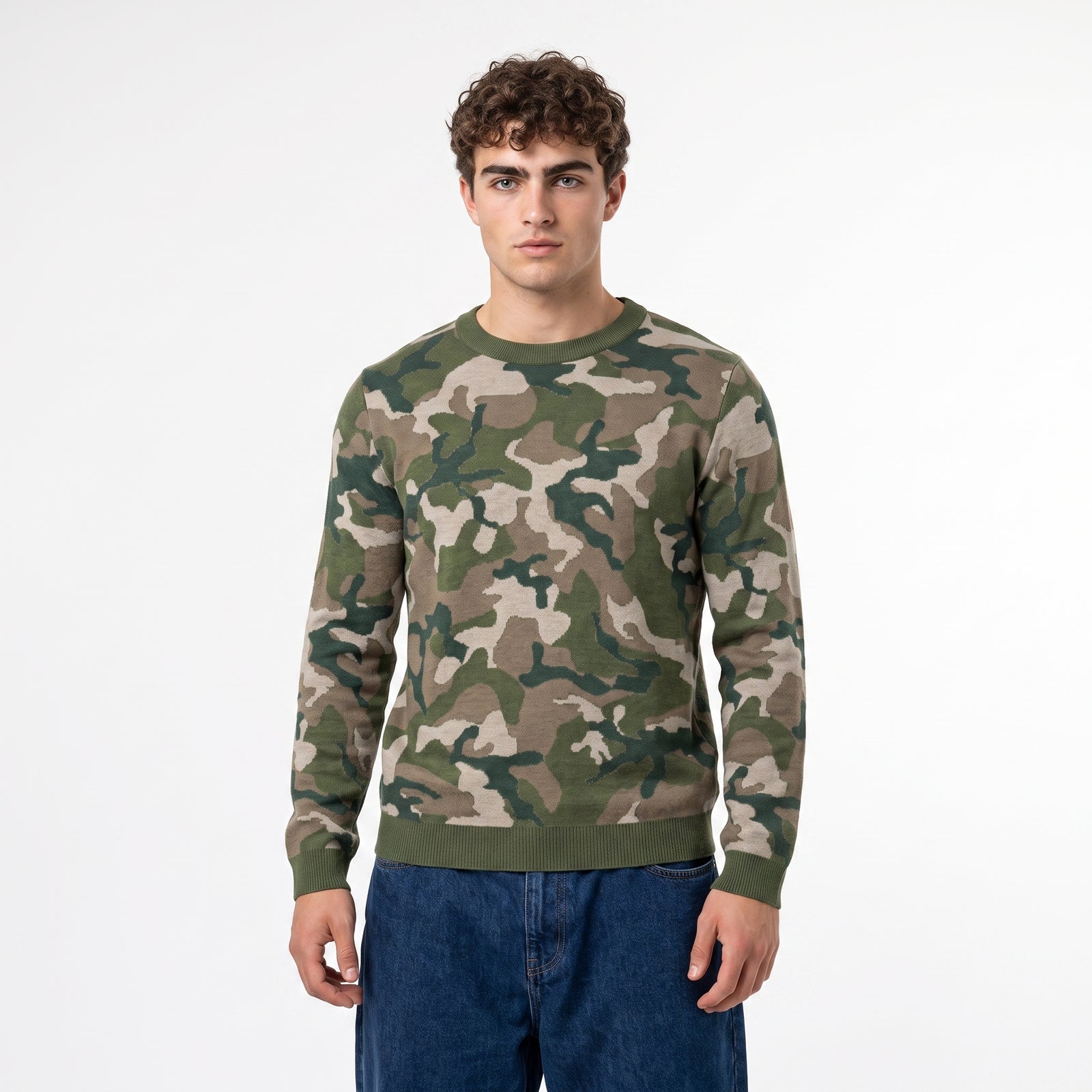 Man wearing a camouflage sweater on a white background