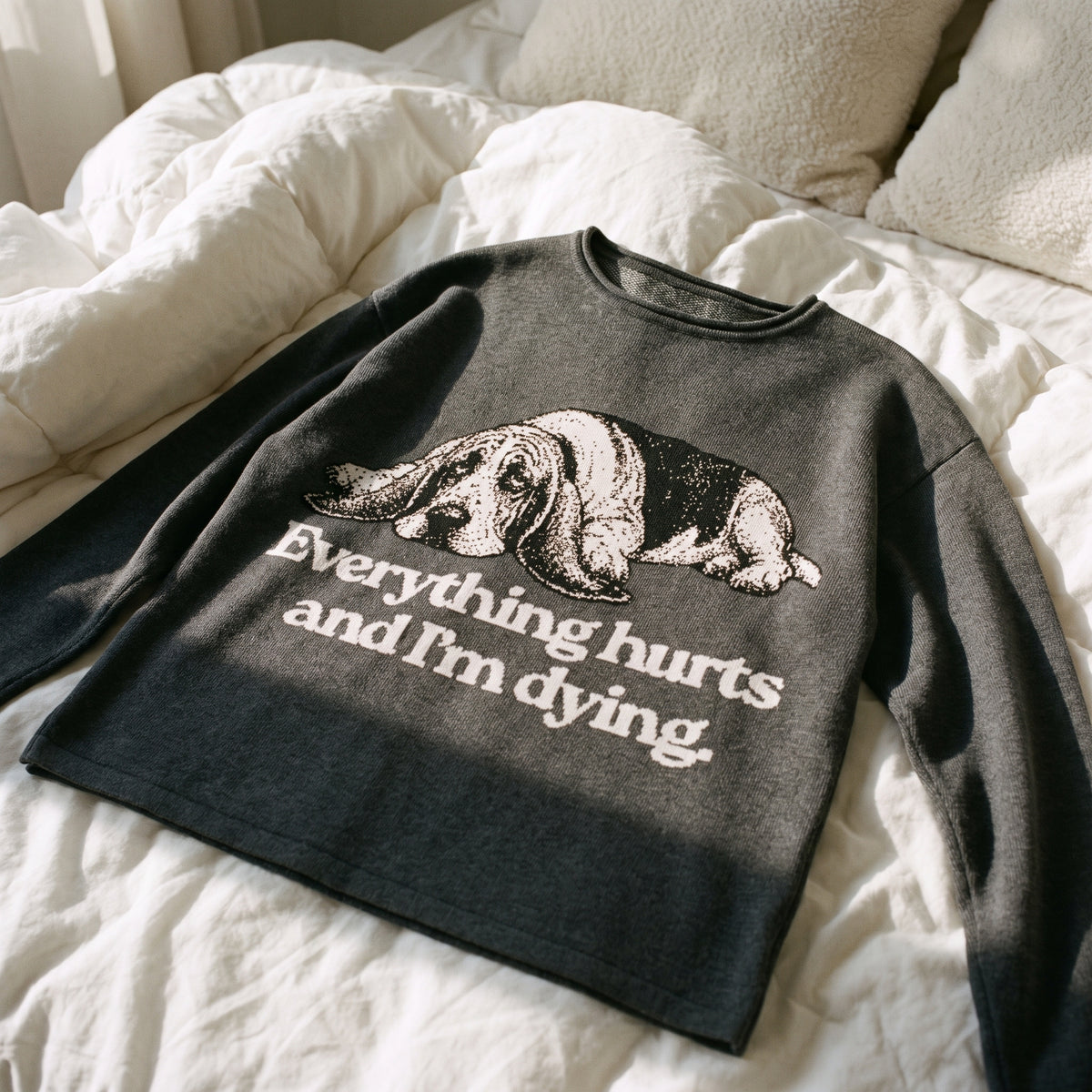 Everything Hurts and I'm Dying women's knit sweater, charcoal gray, basset hound graphic, flat lay front view