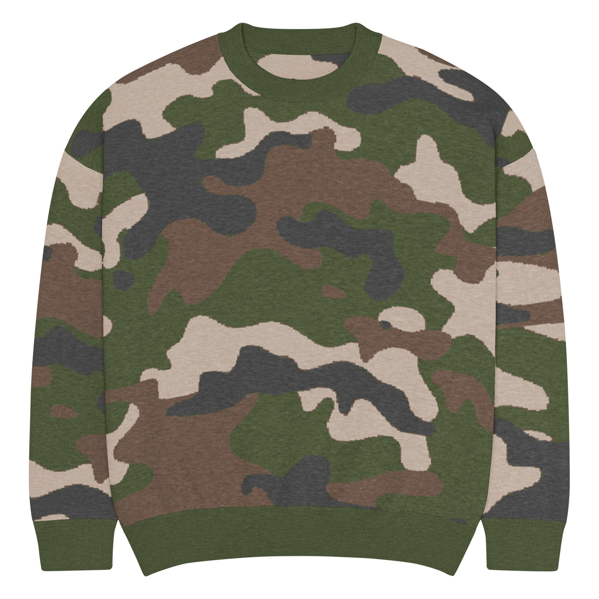 Man in camouflage sweater holding a shotgun with a dog by his side in a wetland setting