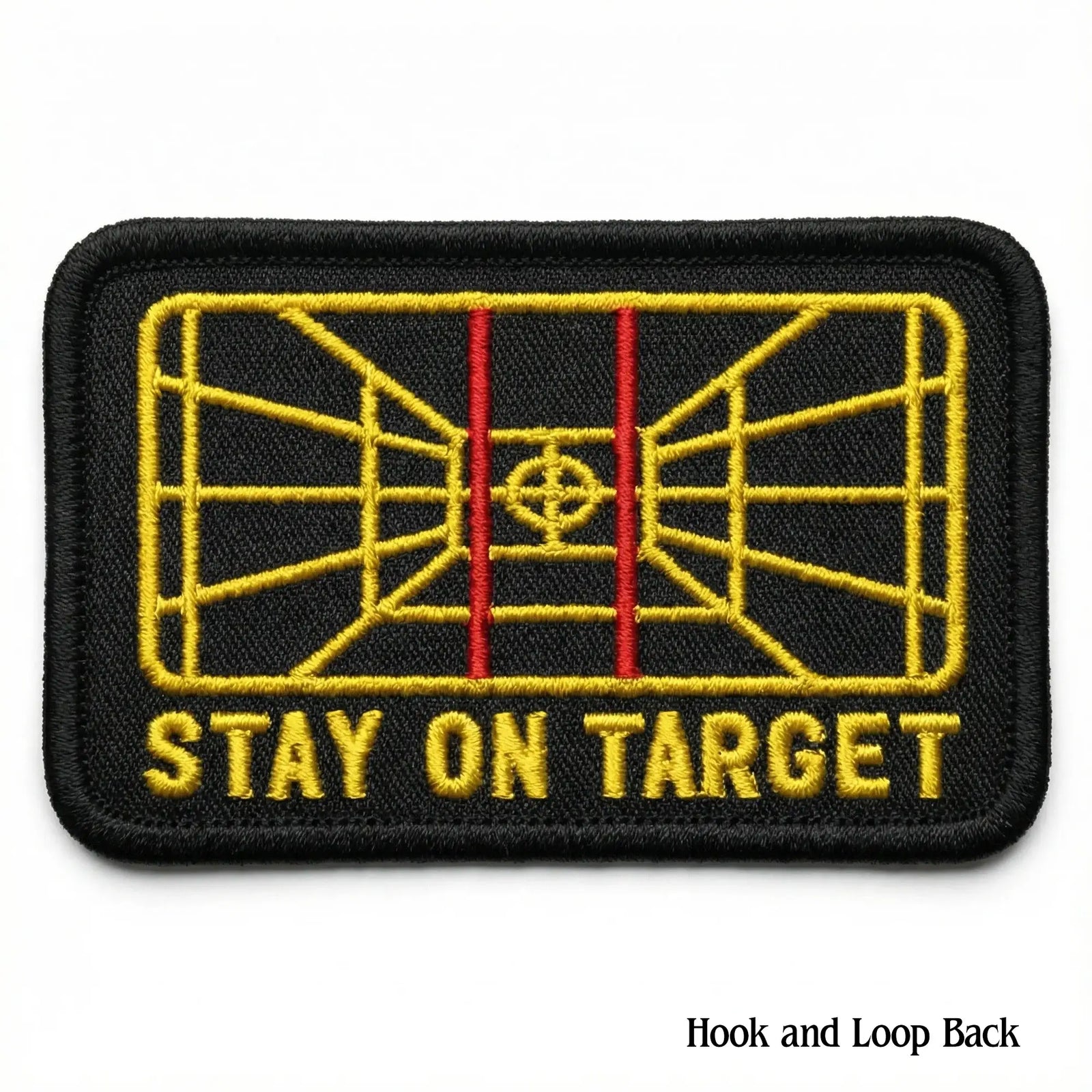 Embroidered patch with 'Stay on Target' text and target design on a black background