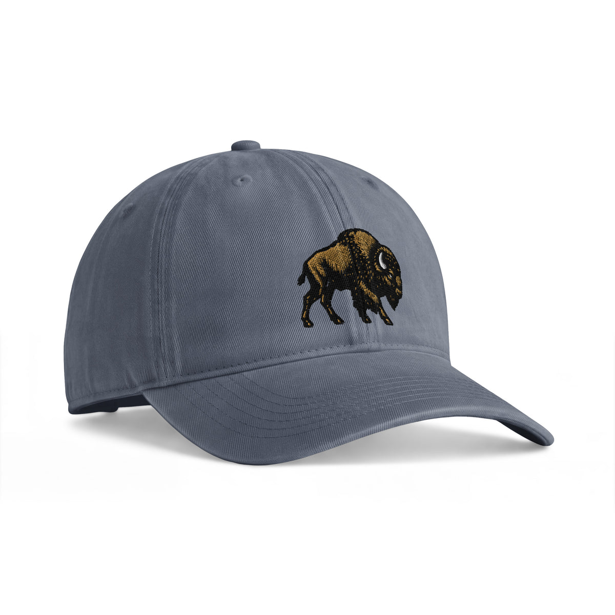 Bison sunwashed cotton cap in Denim, angled front view showing bison embroidery and the curved bill