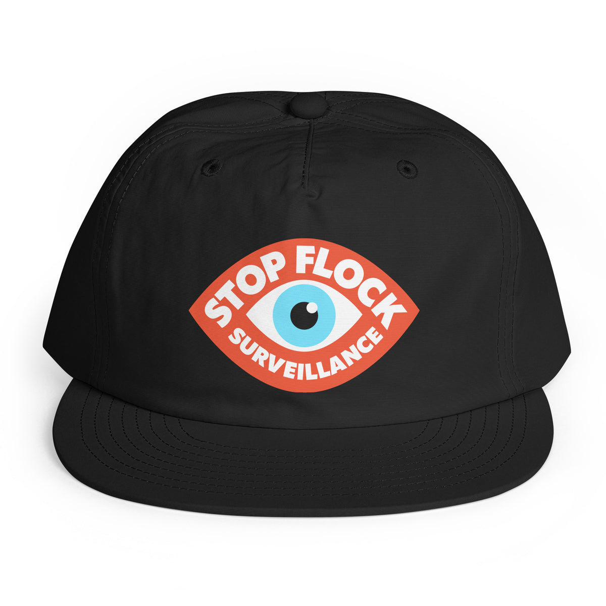 A black flat-brim baseball cap featuring a red, white, and blue graphic on the front with the text 'STOP FLOCK SURVEILLANCE' surrounding an eye illustration, shown against a plain white background.