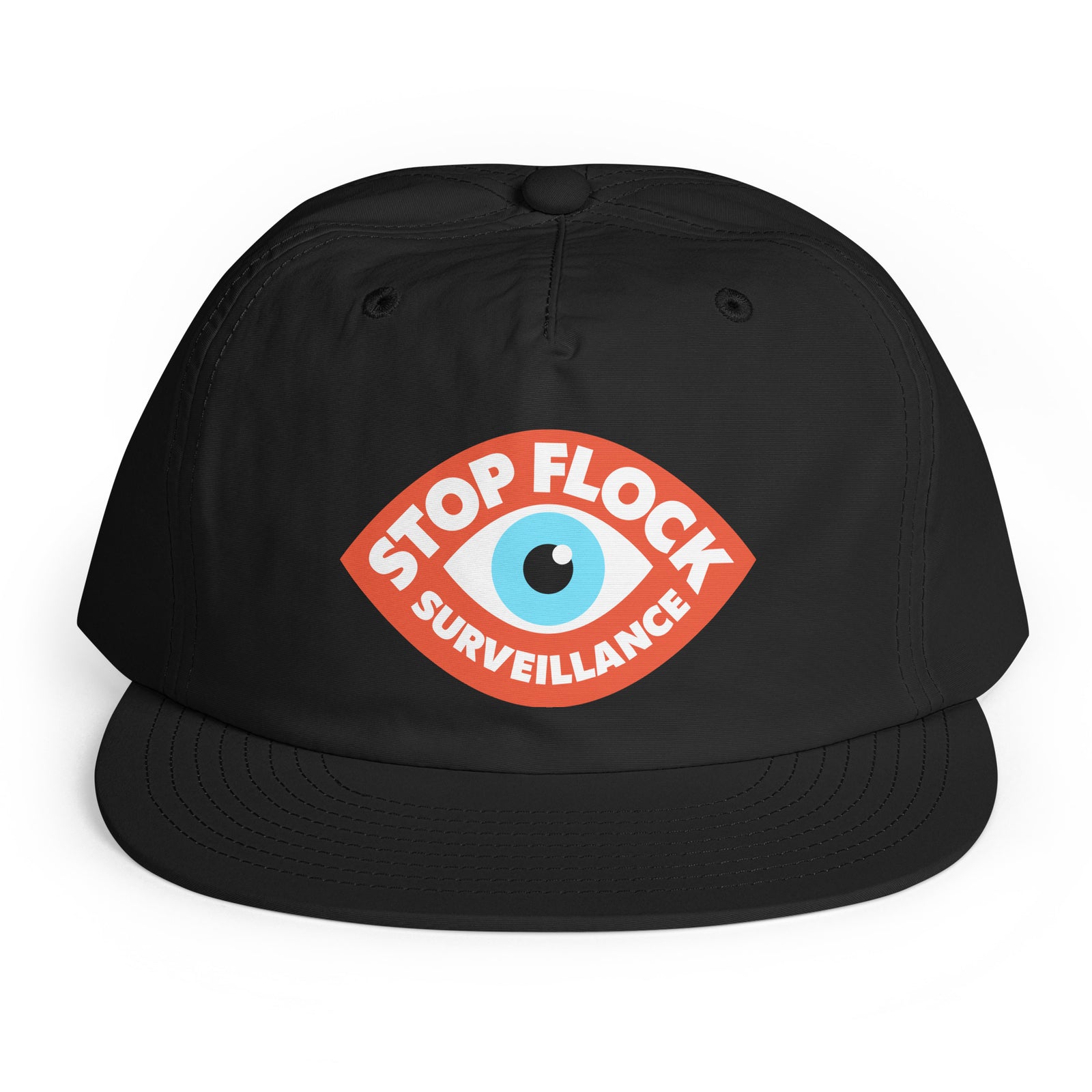 A black flat-brim baseball cap featuring a red, white, and blue graphic on the front with the text 'STOP FLOCK SURVEILLANCE' surrounding an eye illustration, shown against a plain white background.