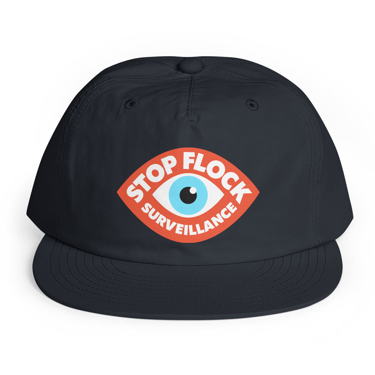 A black baseball cap featuring a red shield-shaped graphic on the front with a light blue eye in the center and the words 'STOP FLOCK SURVEILLANCE' in white.