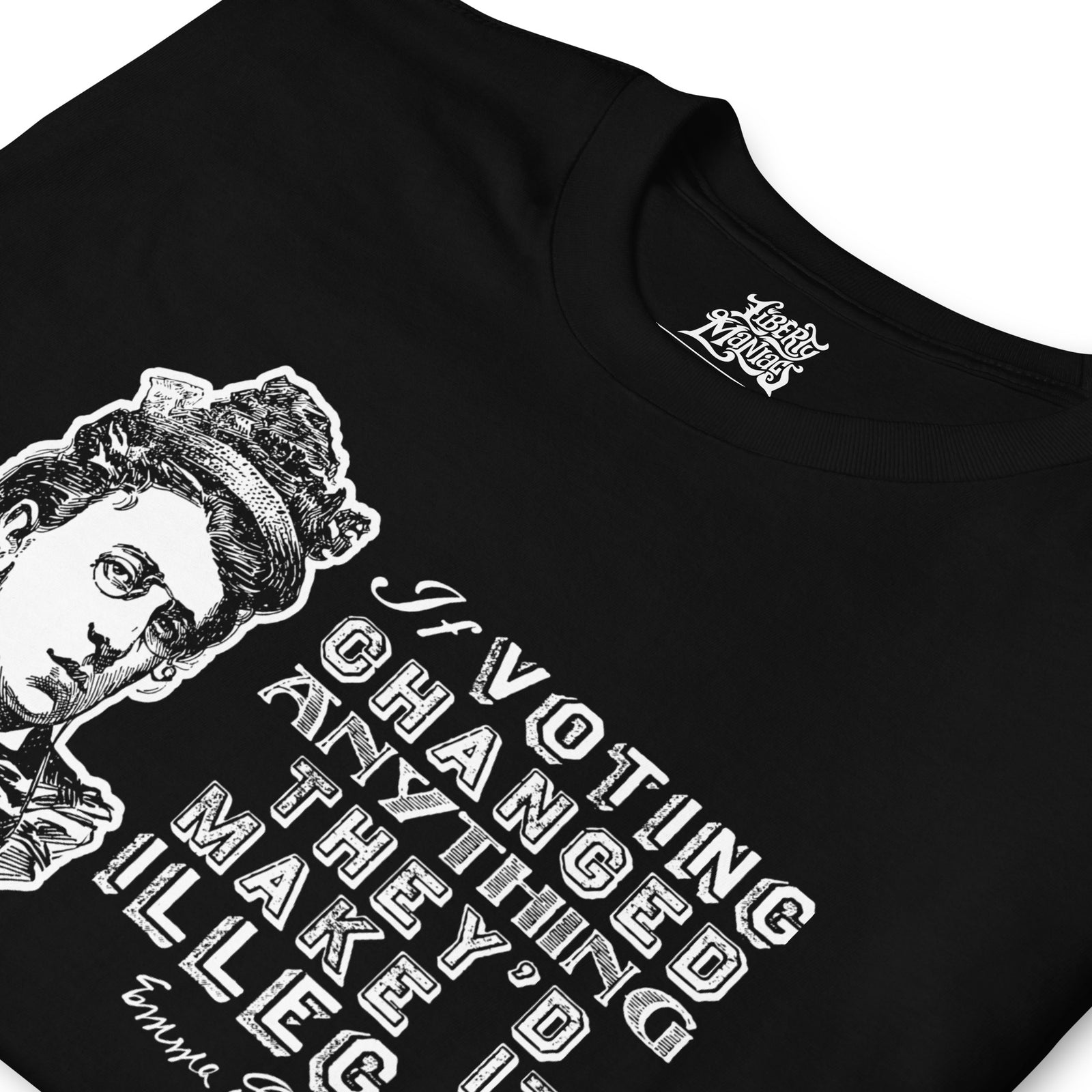 Angled close-up of the black Liberty Maniacs Emma Goldman shirt, showing the portrait and distressed white voting quote print.