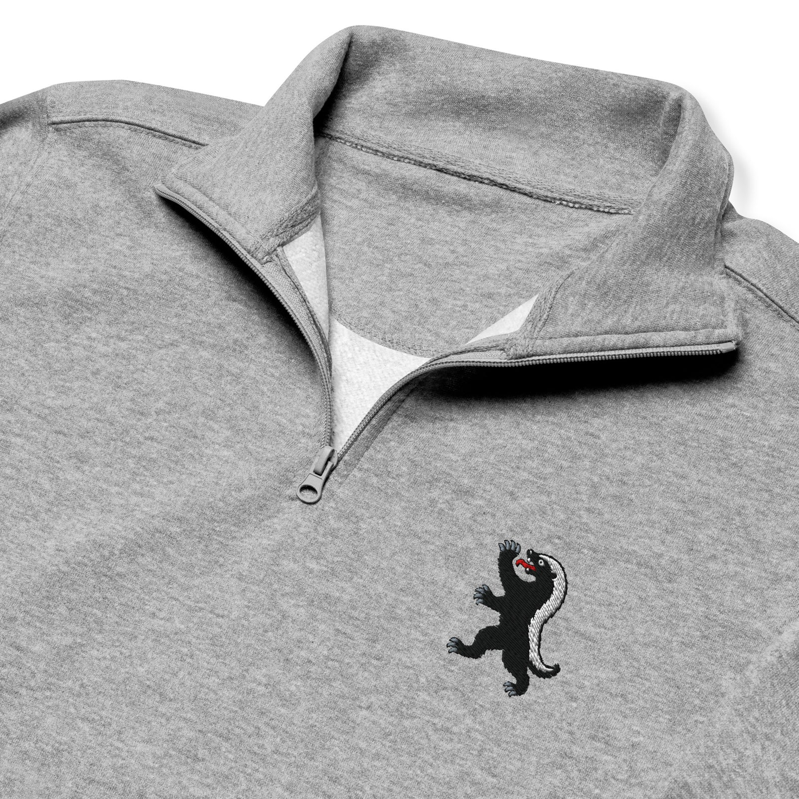 Heraldic Honey Badger Fleece Quarter-Zip Pullover in Carbon Grey, front view with chest embroidery, open collar, and ribbed cuffs