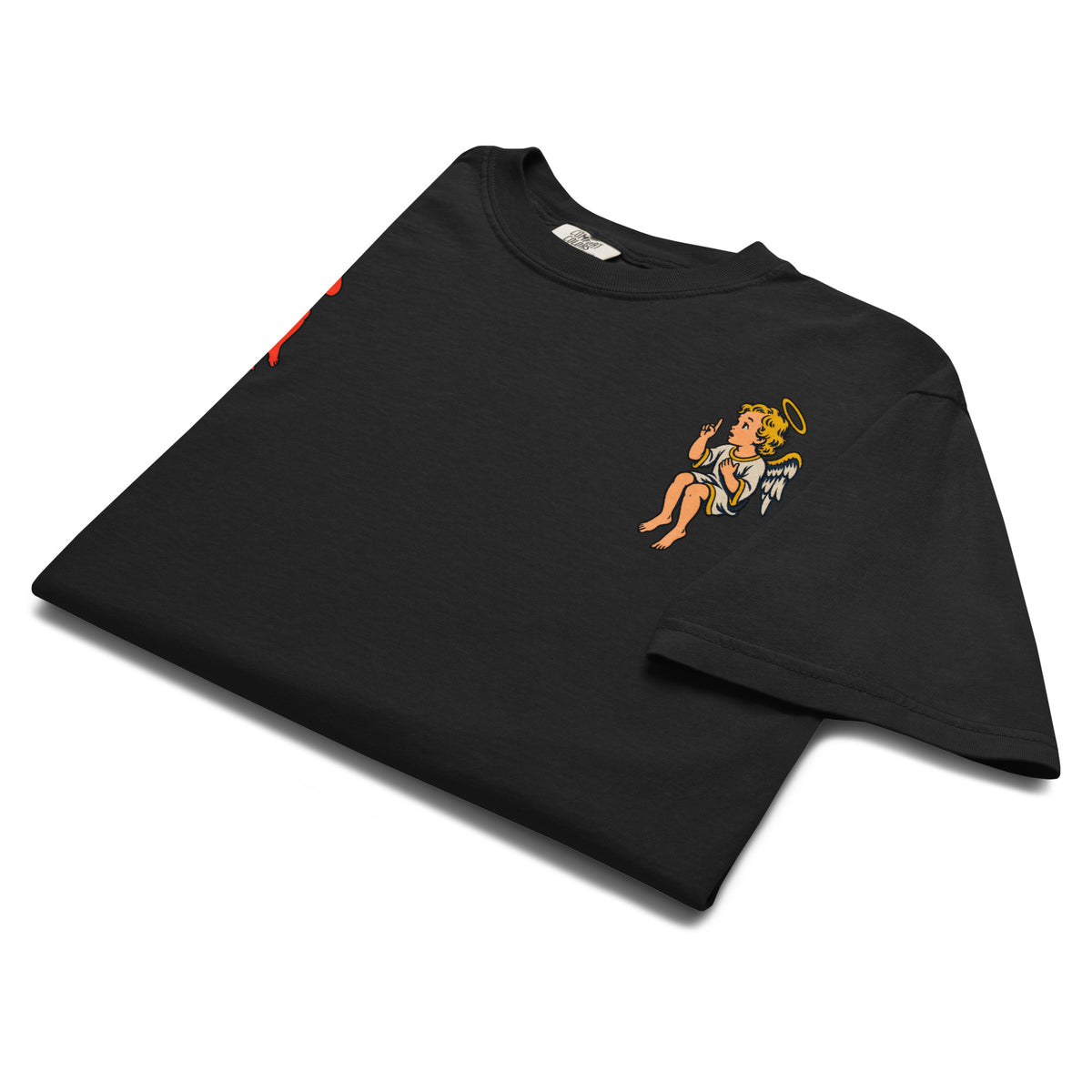 Angled view of black heavyweight tee with vintage angel and devil shoulder graphics