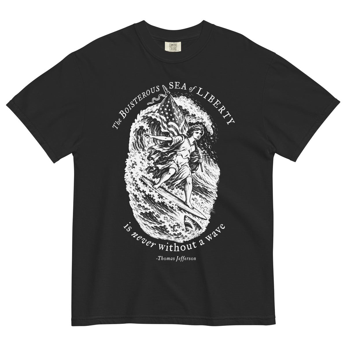 Sea of Liberty Thomas Jefferson quote T-shirt in Black, front view with white engraved-style surfing design