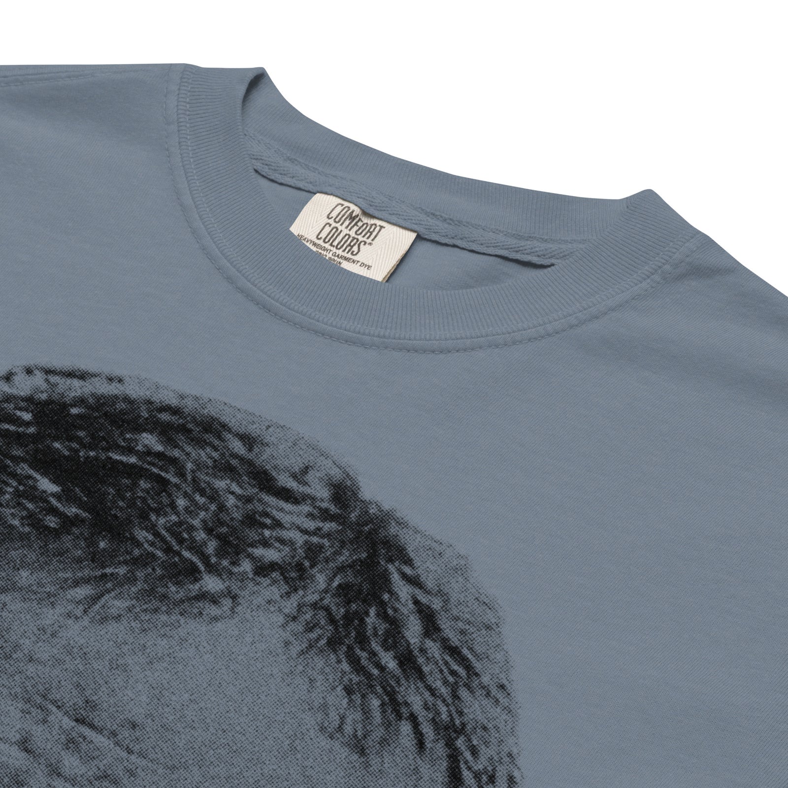 Blue t-shirt with a black graphic design on a white background