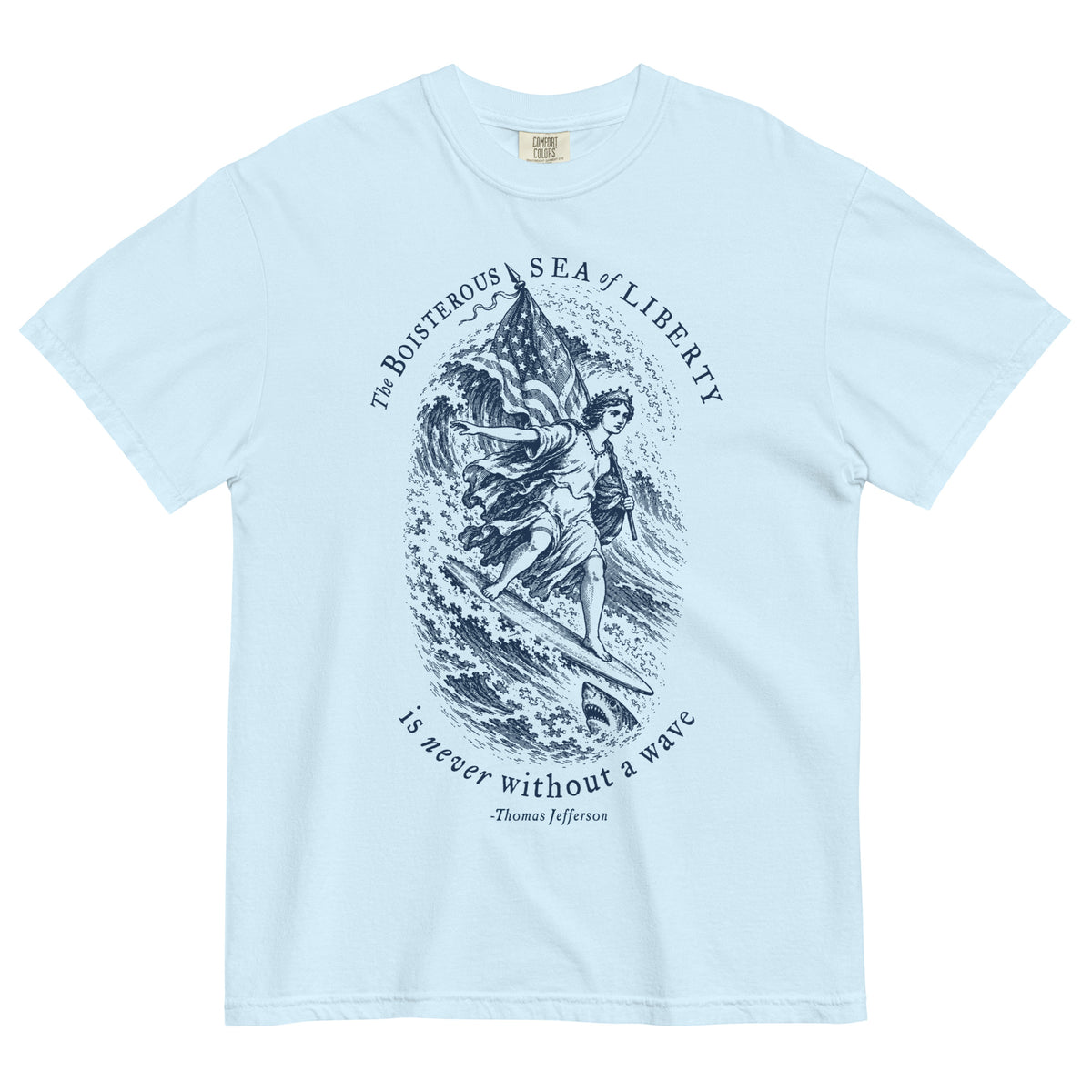 Chambray Sea of Liberty heavyweight T-shirt laid flat, front view with full surfing Liberty design and quote