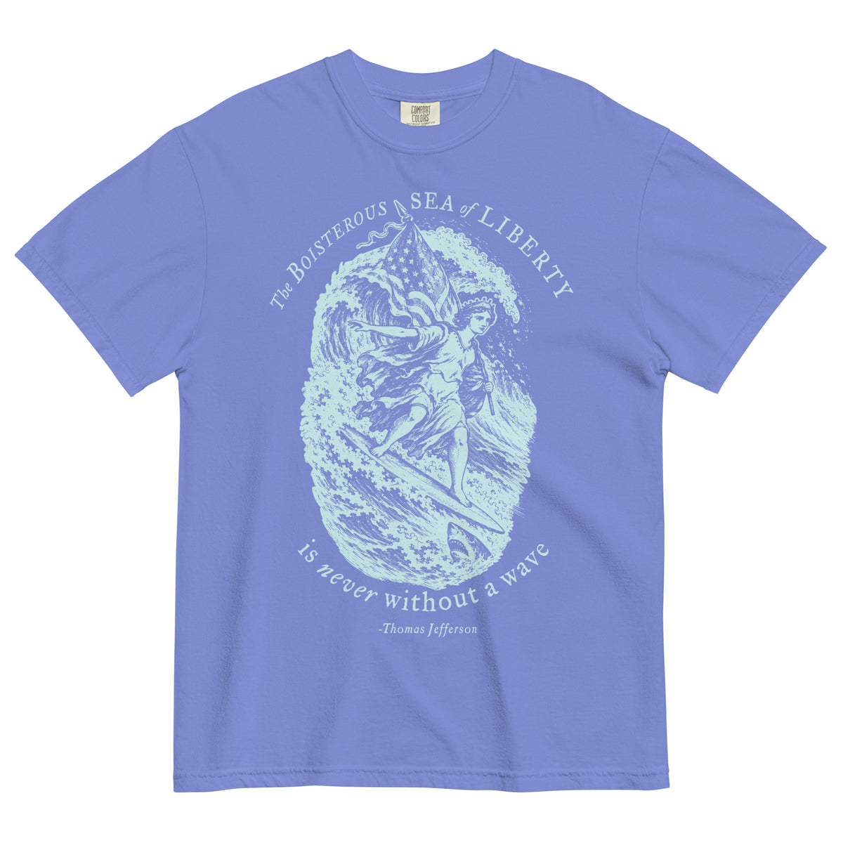 Sea of Liberty Jefferson quote heavyweight T-shirt in Flo Blue, front view with pale surfing Liberty print