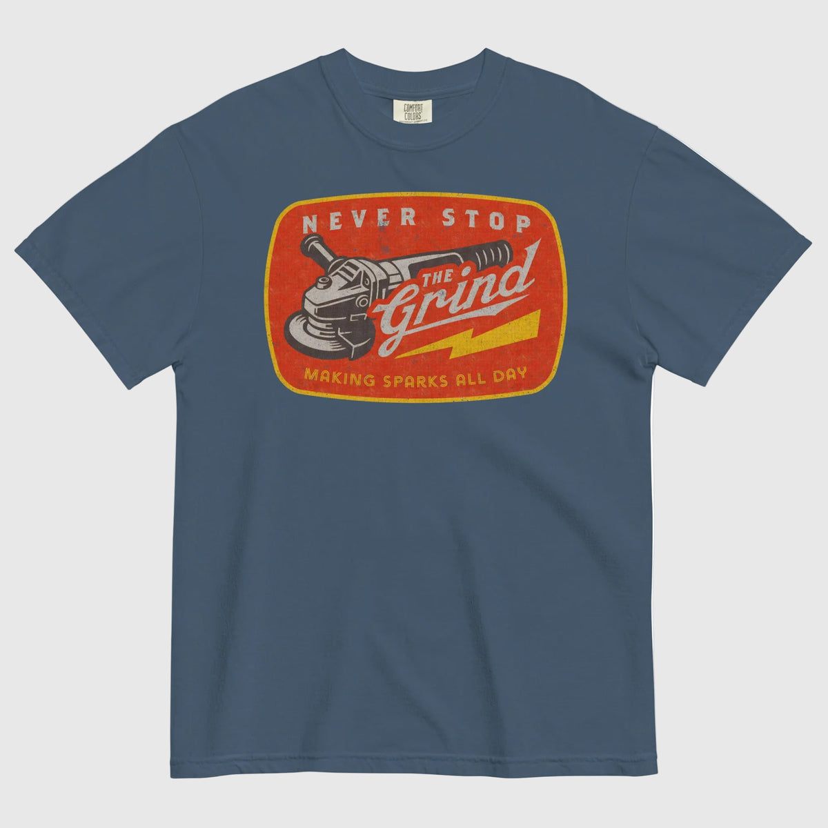 Blue t-shirt with a graphic design featuring a grinder and text on a white background