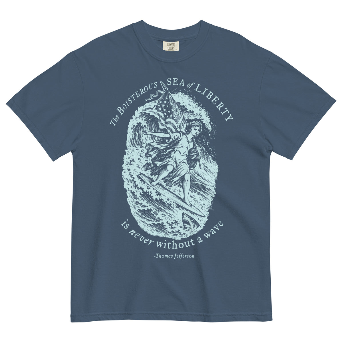 Jefferson Sea of Liberty heavyweight T-shirt in Midnight, front view with pale blue surfing illustration and quote