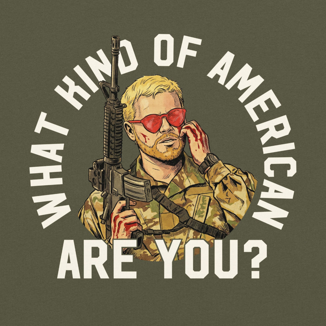 T-shirt design with a person holding a rifle and sunglasses, text 'What Kind of American Are You?' on a dark green background.