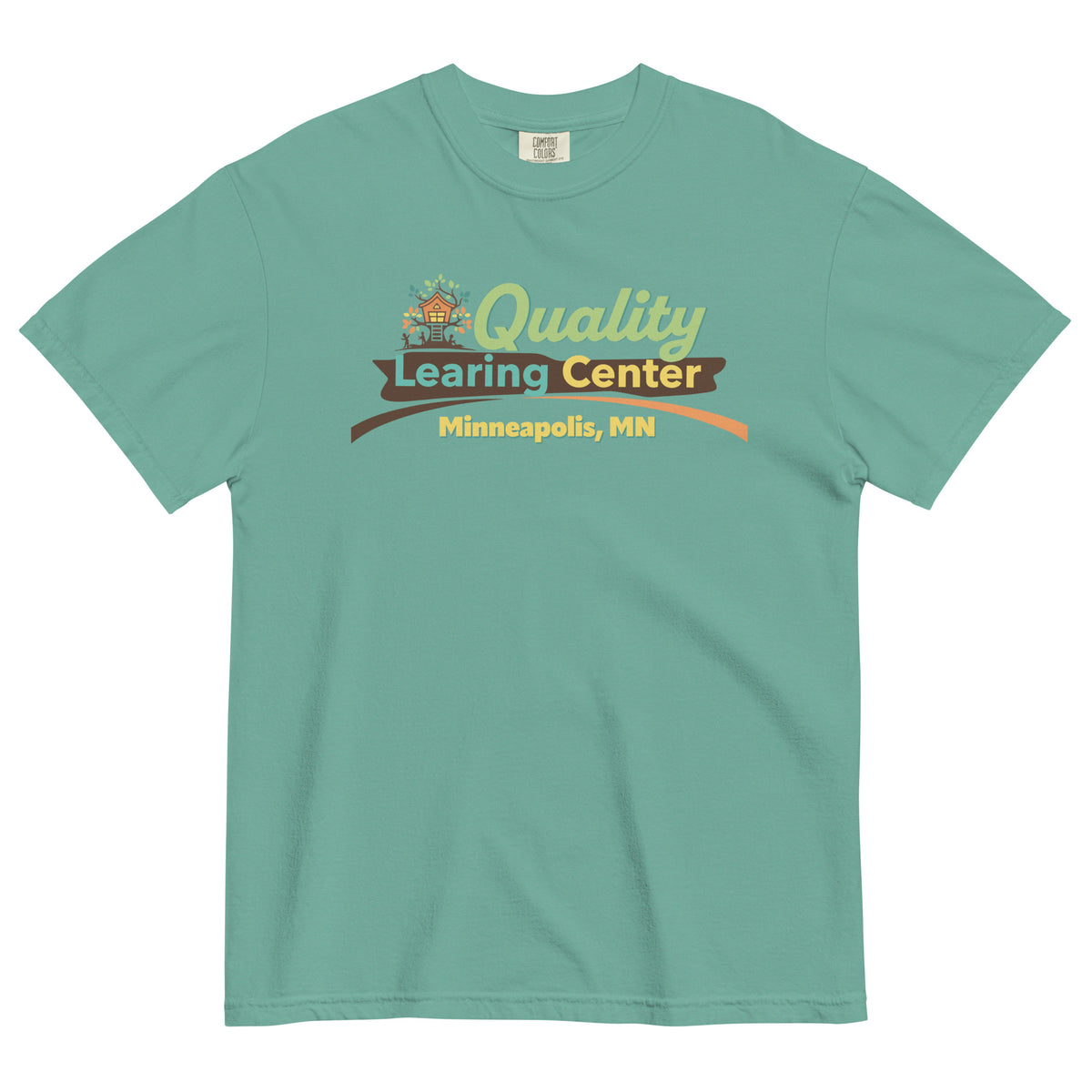 Green t-shirt with 'Quality Learing Center Minneapolis, MN' text and logo on a white background