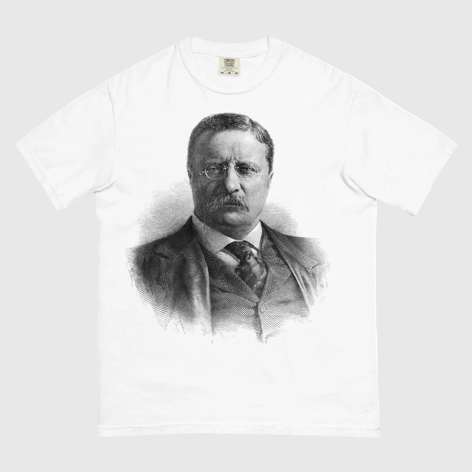 White t-shirt with a black and white portrait print on a white background