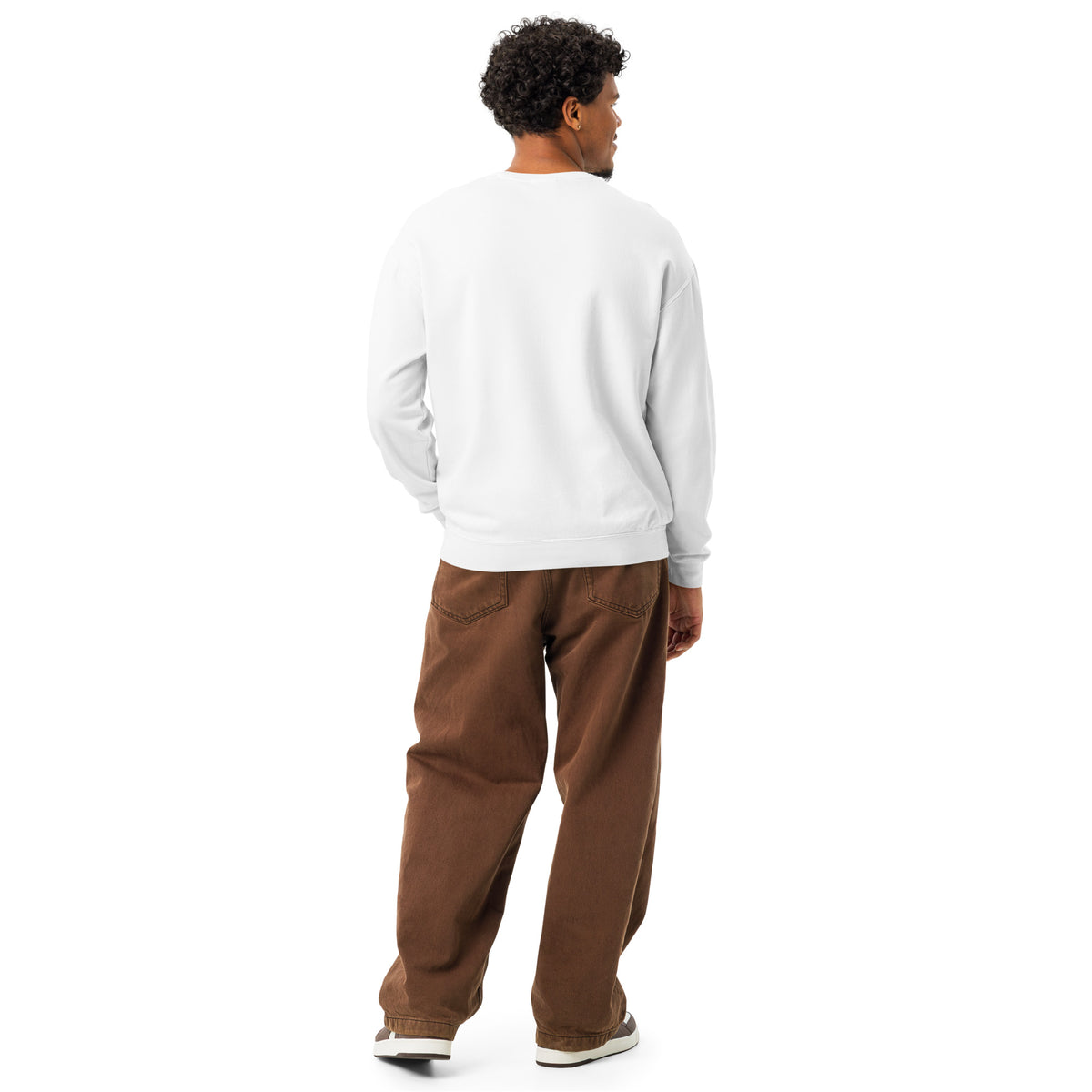 Person wearing a white sweatshirt and brown pants on a white background