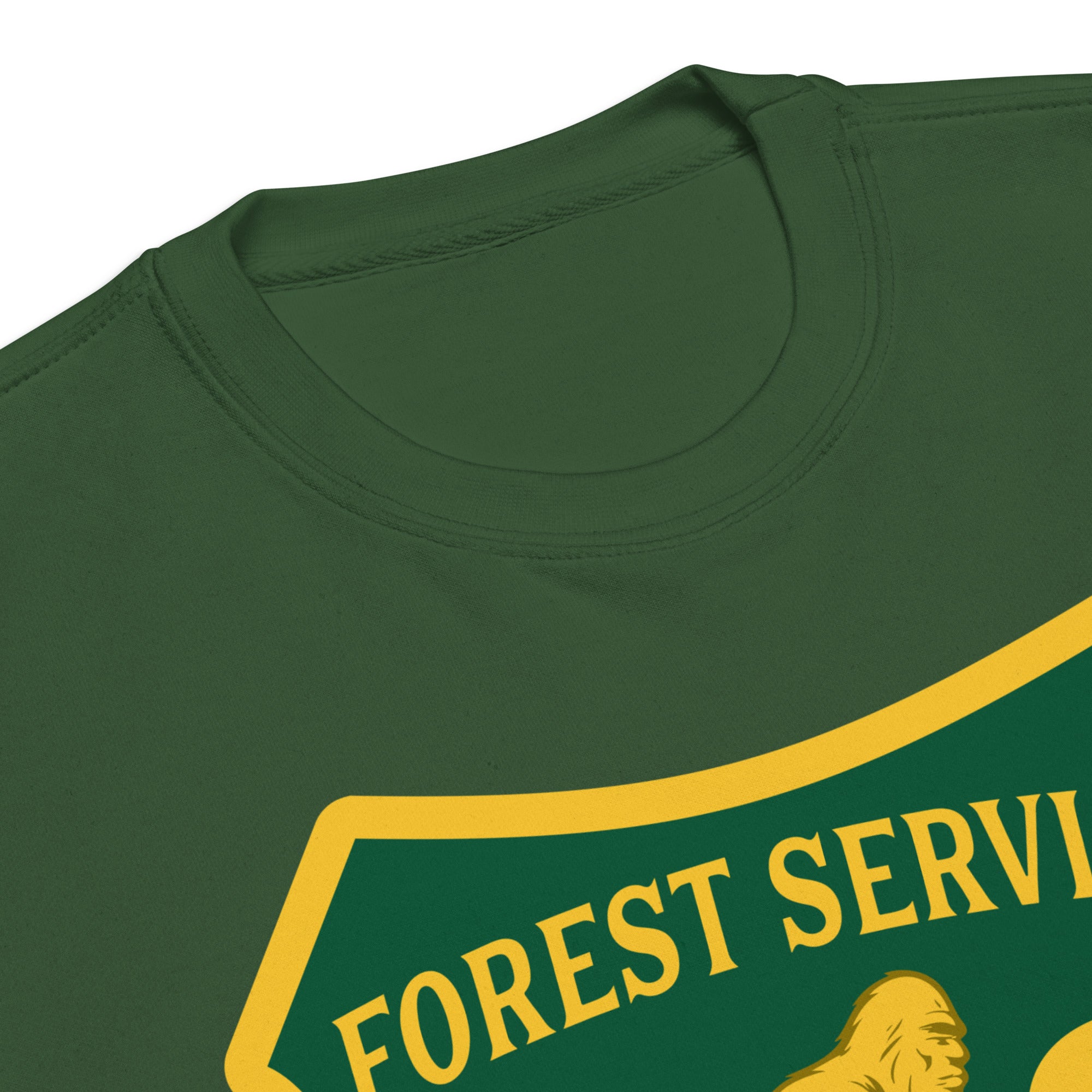 Green shirt with 'Forest Service' text and bear graphic on a white background