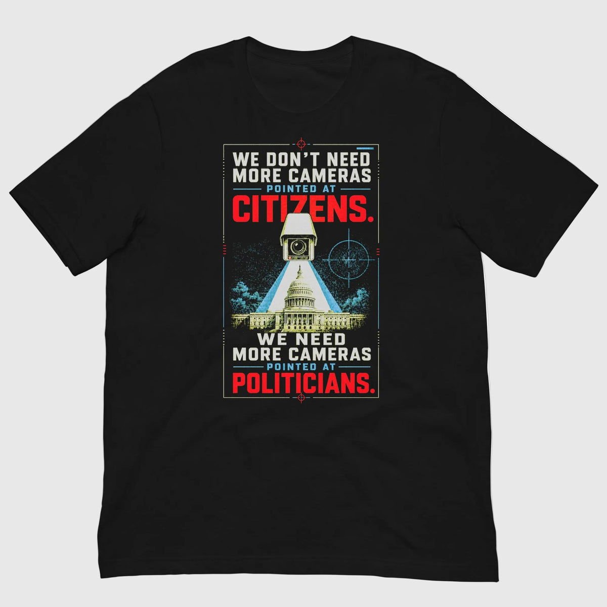 Black t-shirt with a graphic and text about cameras pointed at citizens and politicians on a white background.