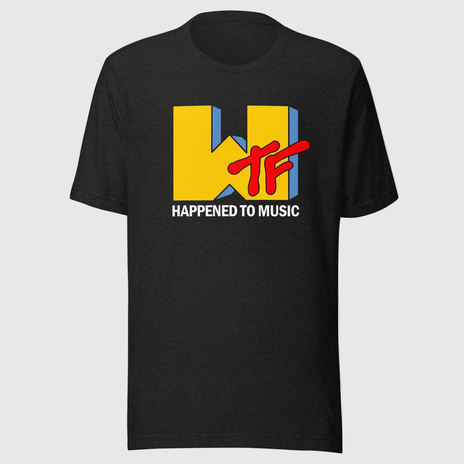 Man wearing a black t-shirt with a colorful logo that asks "WTF happened to music?" in a parody style of the MTV logo. From Liberty Maniacs.