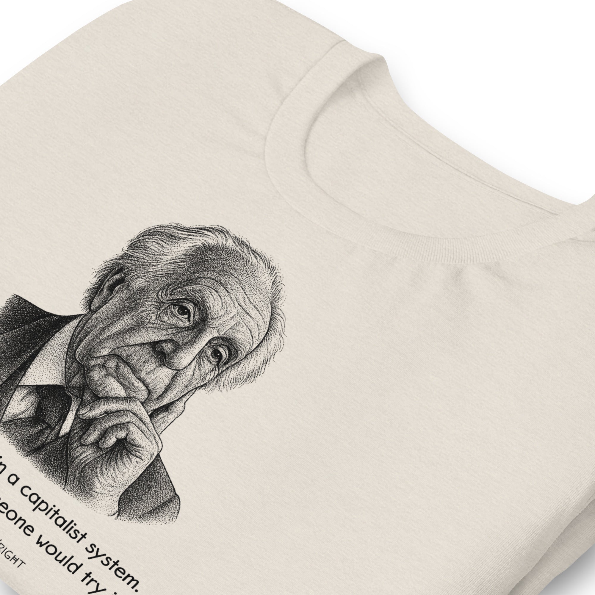 T-shirt with a pointillist illustrated portrait of Frank Lloyd Wright with a quote about capitalism on a white background
