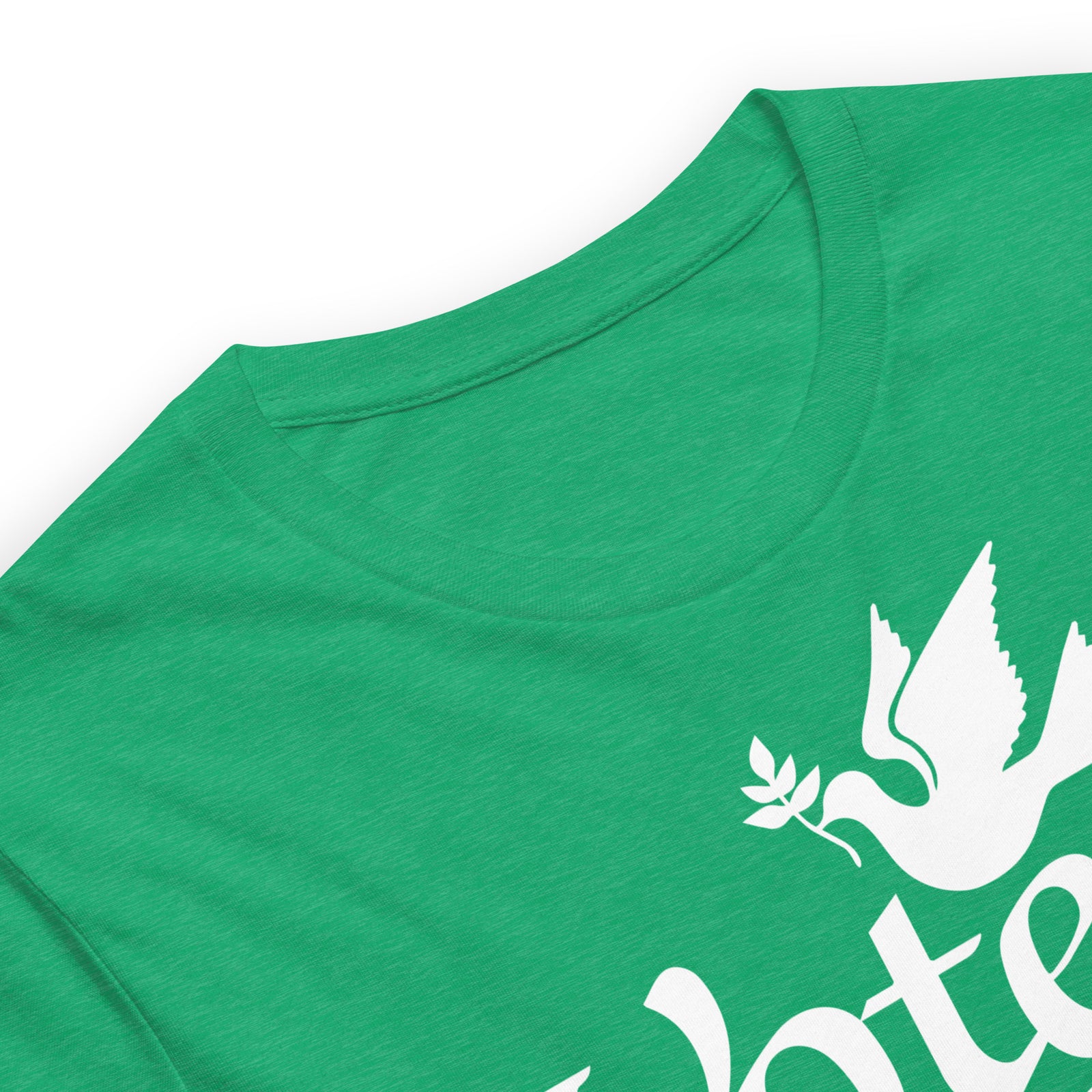 Close-up of a bright green short-sleeve t-shirt with a white graphic of a dove holding an olive branch and partial white text on the front.