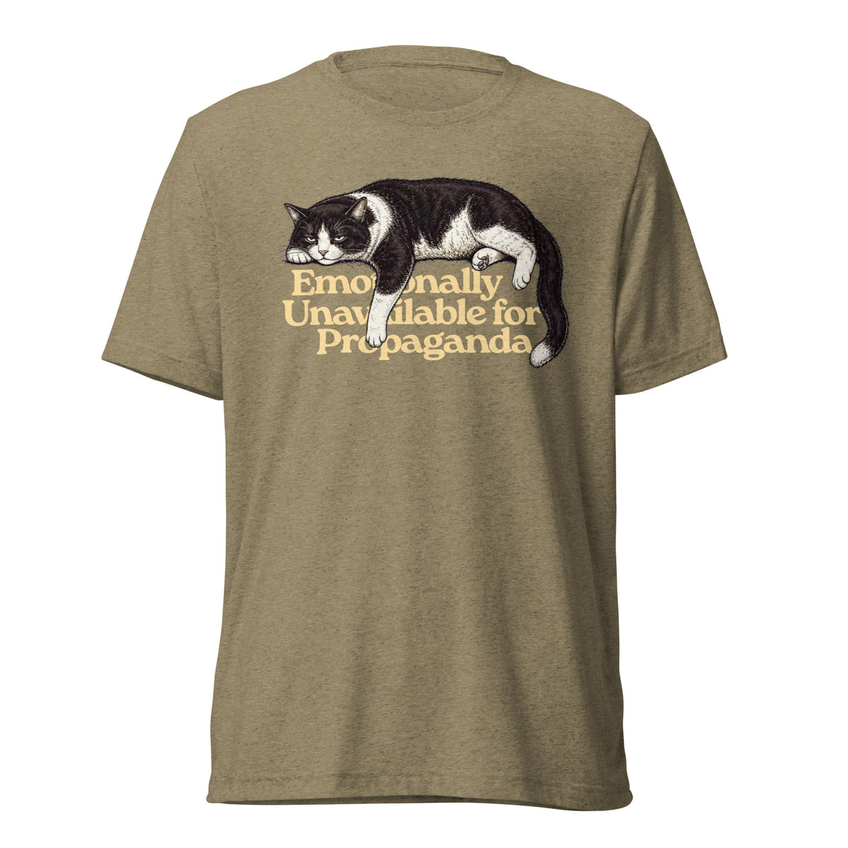 A heathered olive green short-sleeve t-shirt featuring a graphic of a black and white cat lying down with the text 'Emotionally Unavailable for Propaganda' printed in a warm tan font.