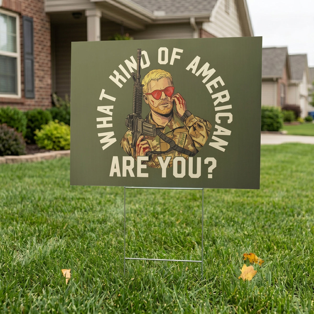 Political protest sign with graphic of a person in military gear and text on a grassy lawn.