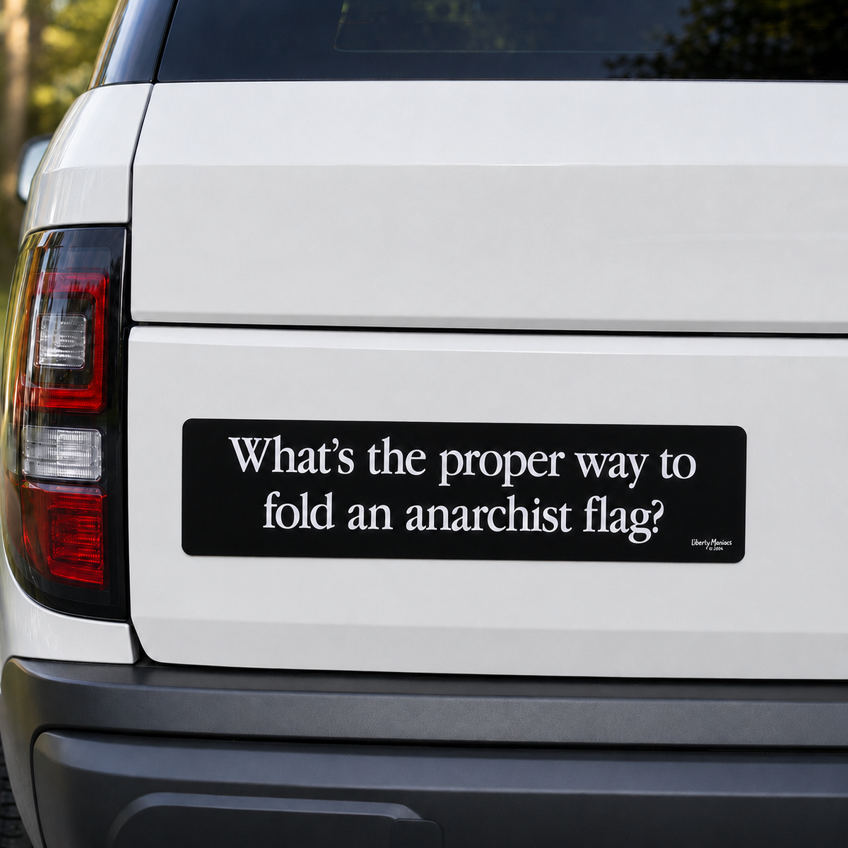 What's the proper way to fold and anarchist flag 15" Truck Bumper Sticker on a white SUV