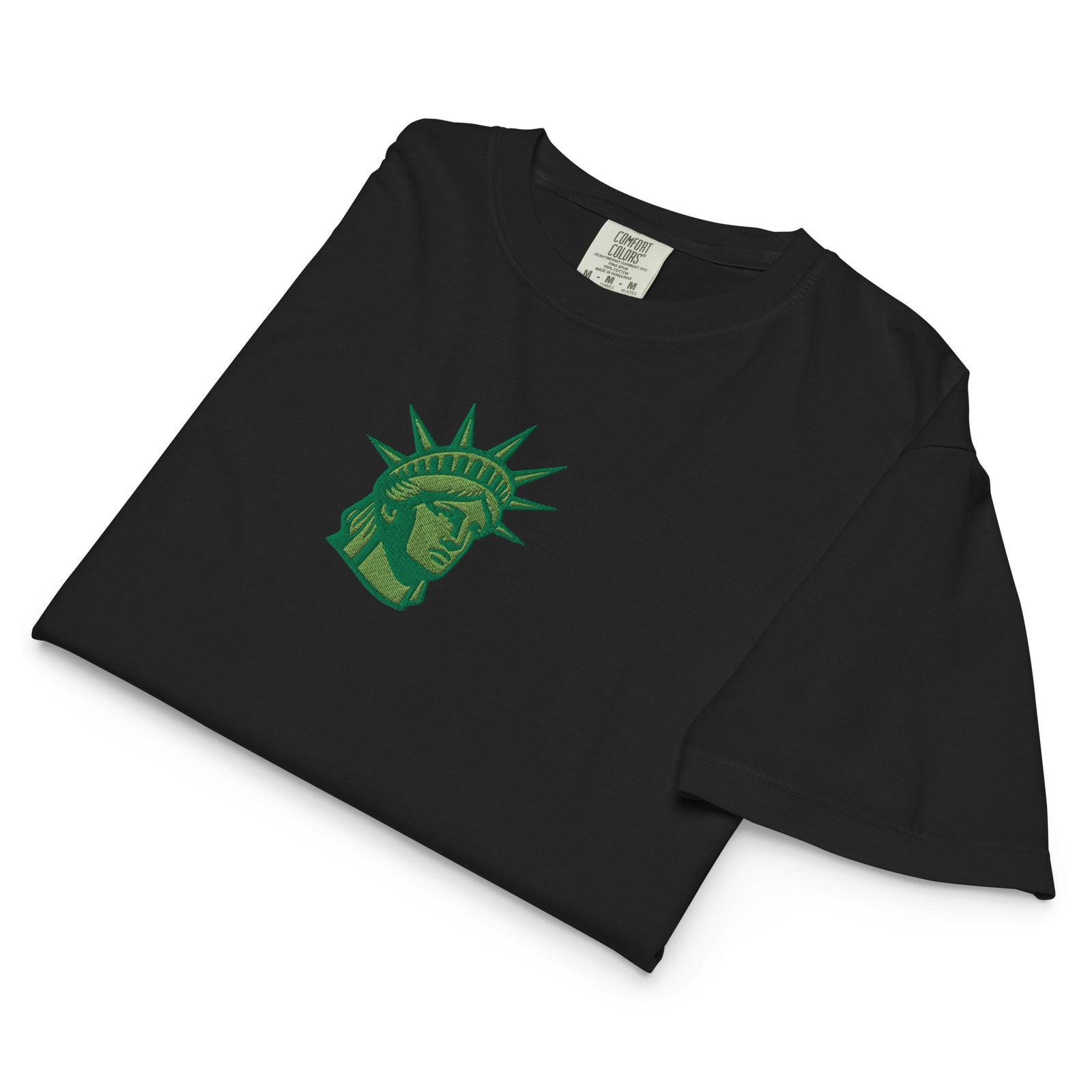 Embroidered Lady Liberty design on women’s boxy tee close-up