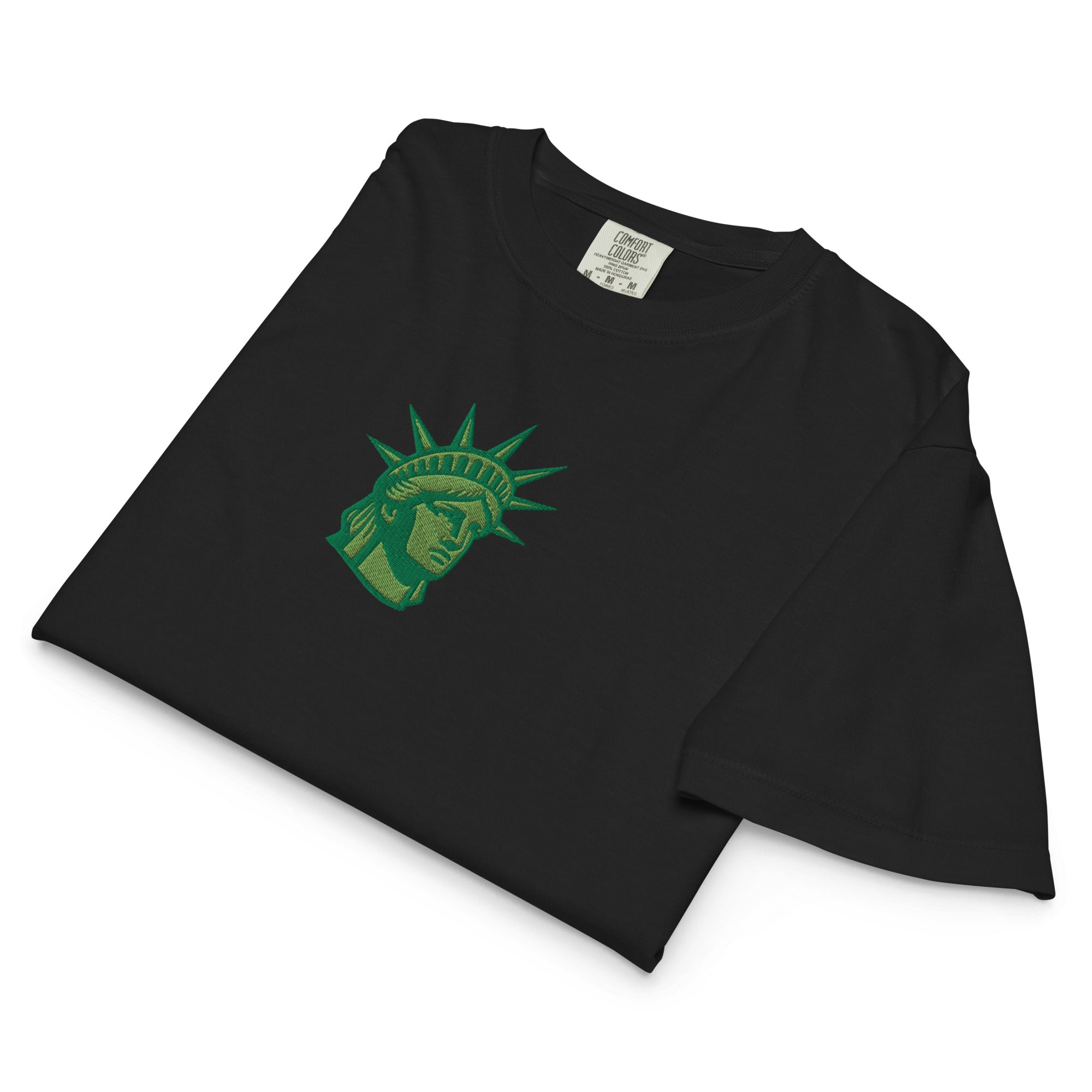 Embroidered Lady Liberty design on women’s boxy tee close-up