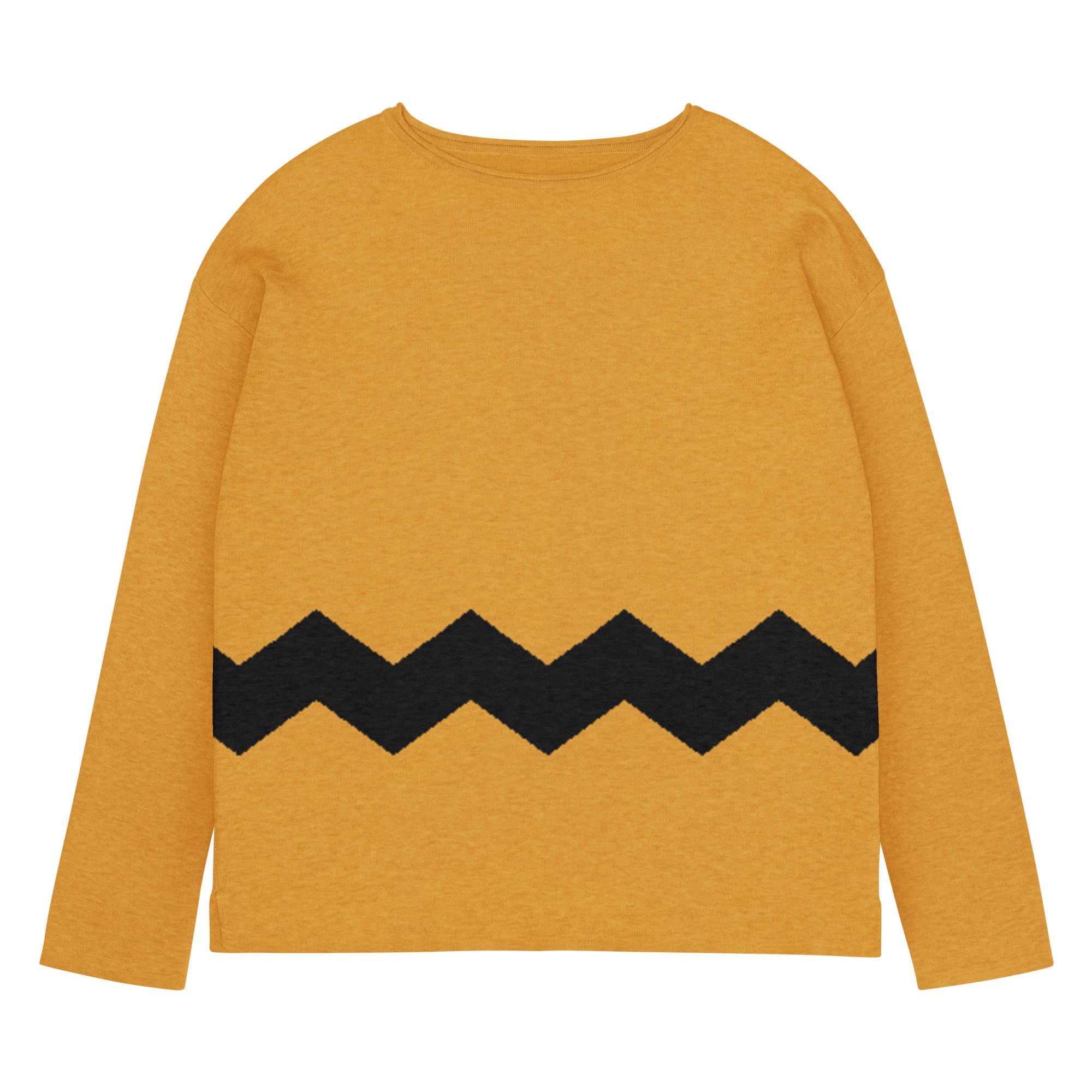 Woman wearing a mustard yellow sweater with a black zigzag pattern on a gray background