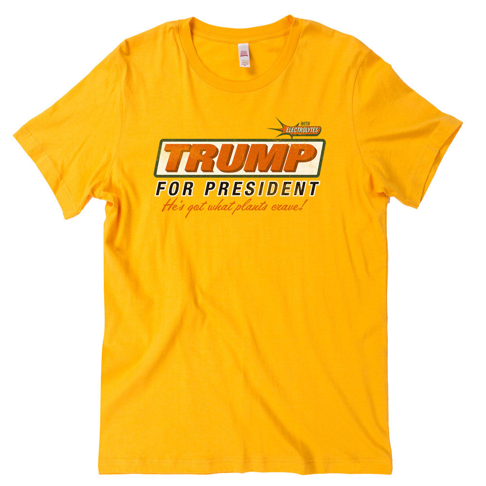 Yellow t-shirt with 'TRUMP FOR PRESIDENT' text and a graphic of Donald Trump's face.