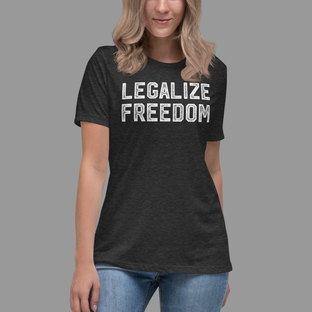 Person wearing a black t-shirt with 'LEGALIZE FREEDOM' text on a gray background