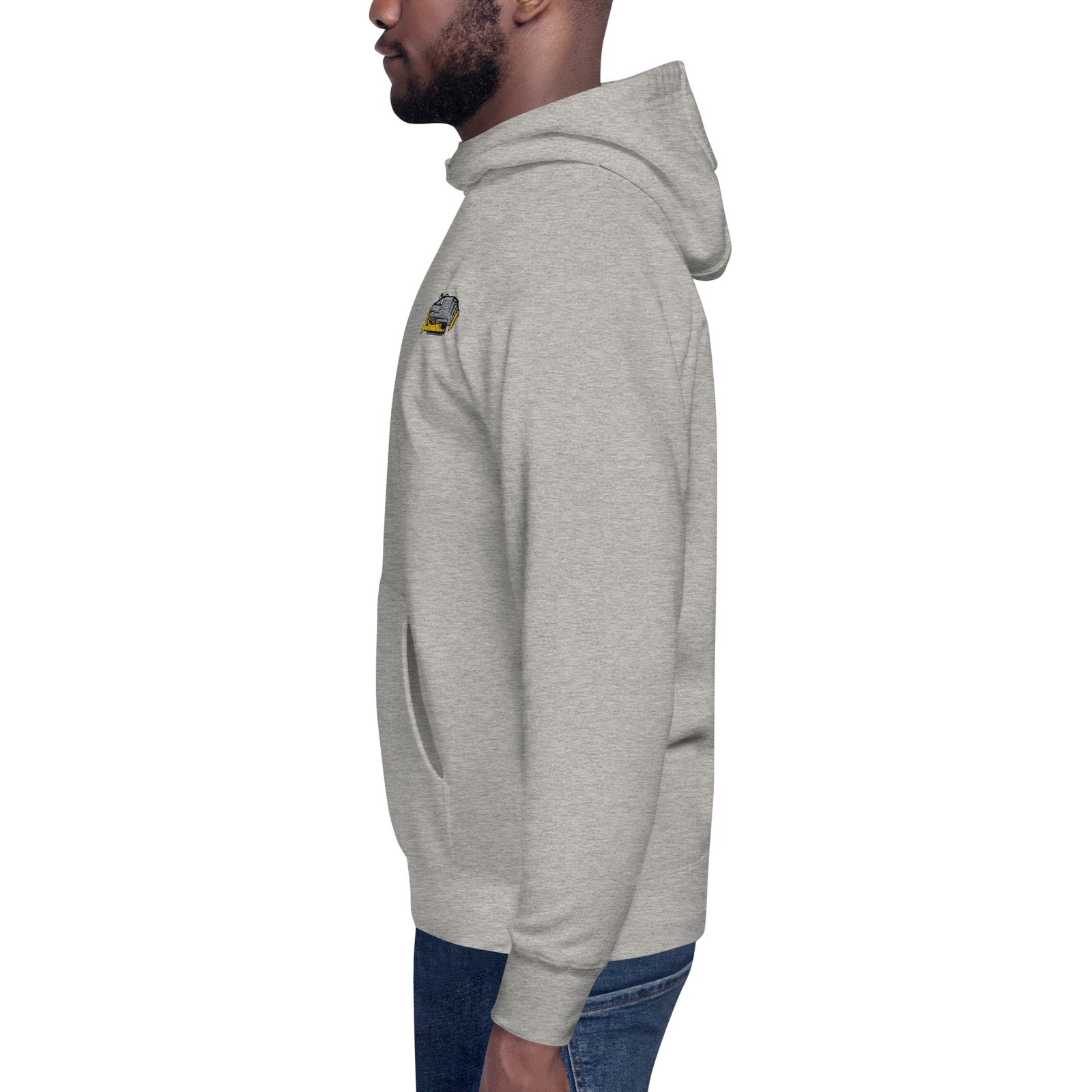 An athletic grey Killdozer Embroidered Hoodie on a model that is standing in profile on a white background. 