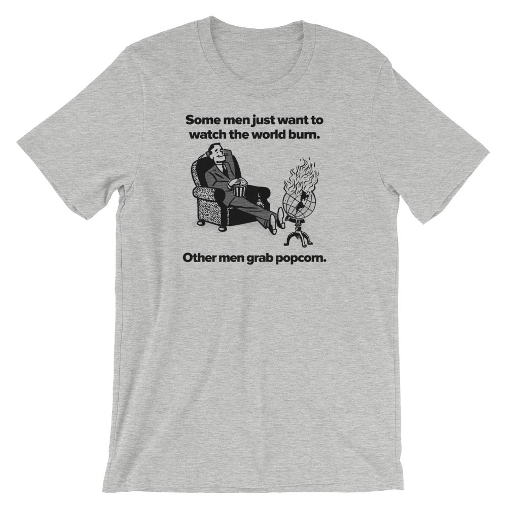 Black t-shirt with graphic print of a character sitting and text that reads 'Some men just want to watch the world burn. Other men grab popcorn.